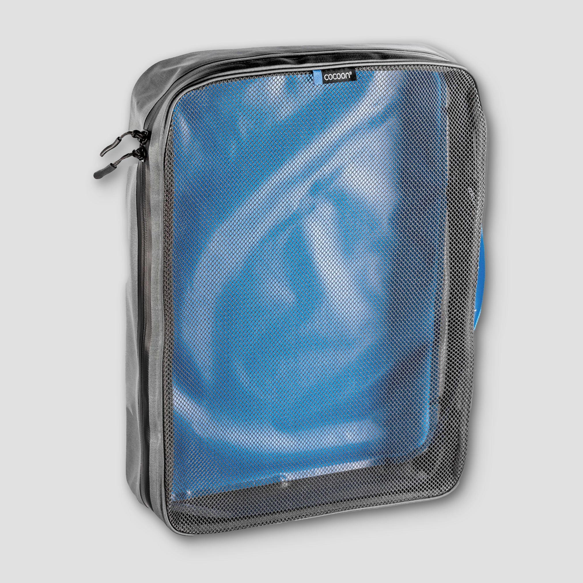Gray travel packing cube with blue mesh pocket on a light gray background