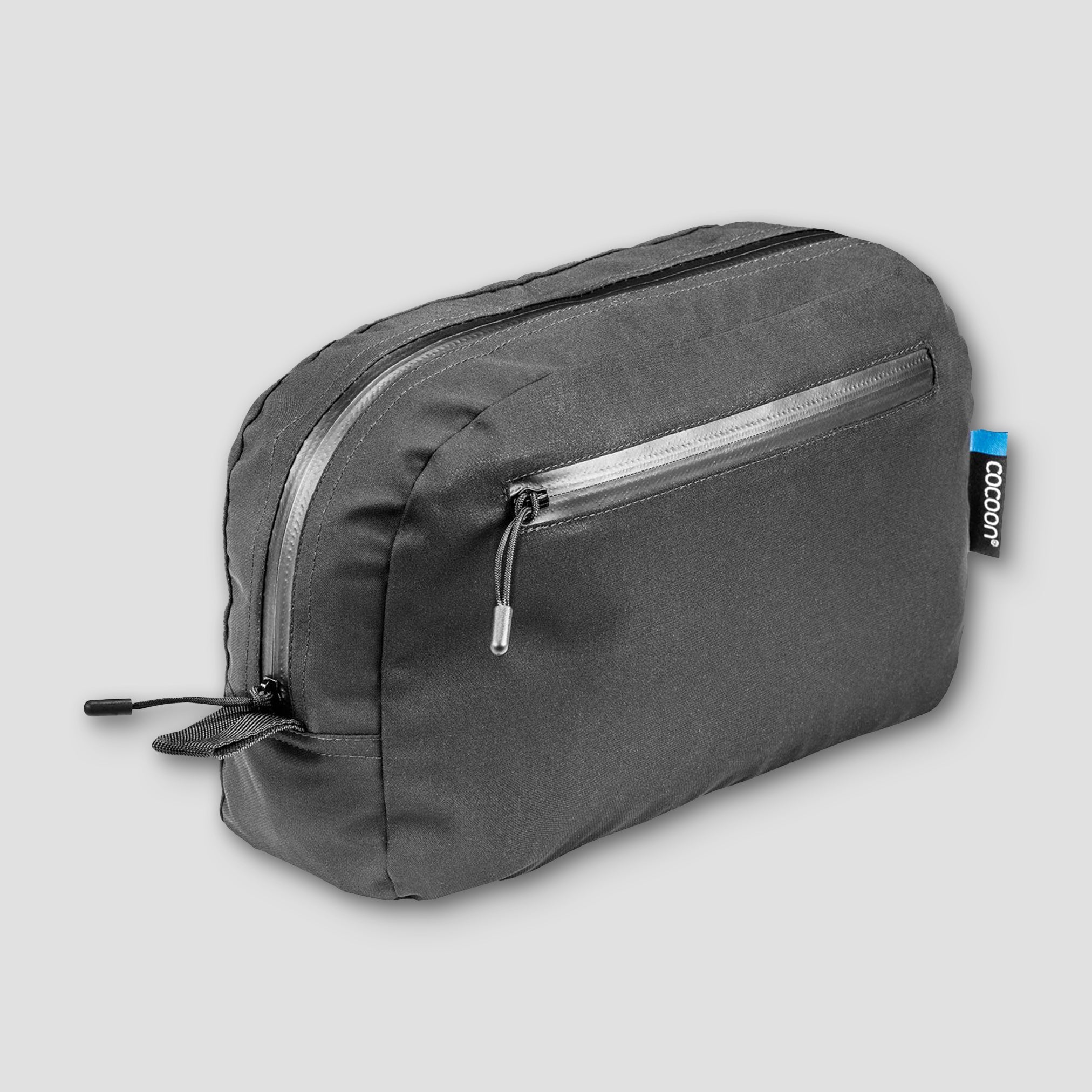 Gray toiletry bag with a visible brand logo on a light gray background