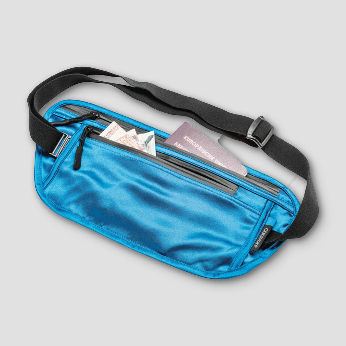 Blue fanny pack with black strap on a light gray background