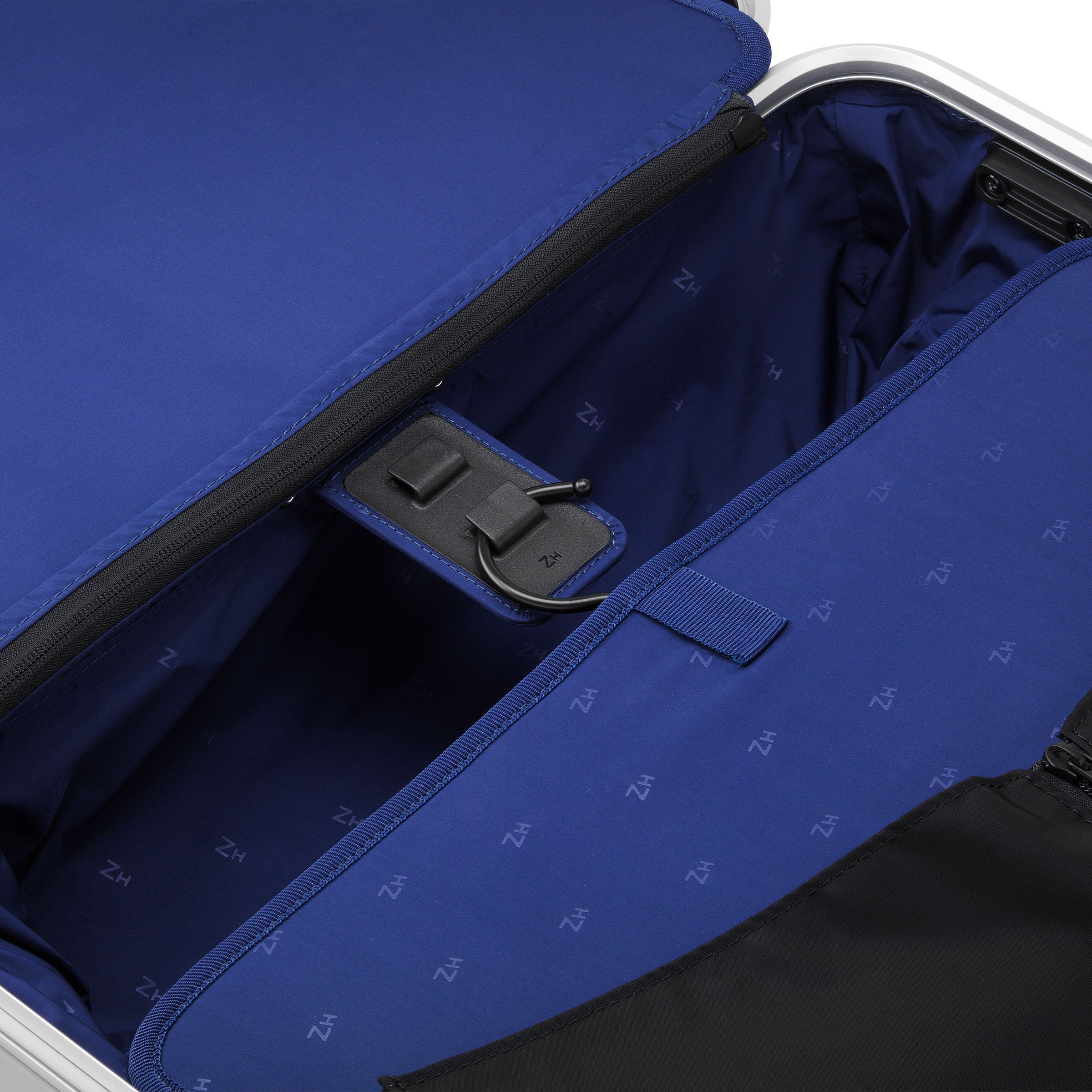 Blue suitcase interior with visible brand logo