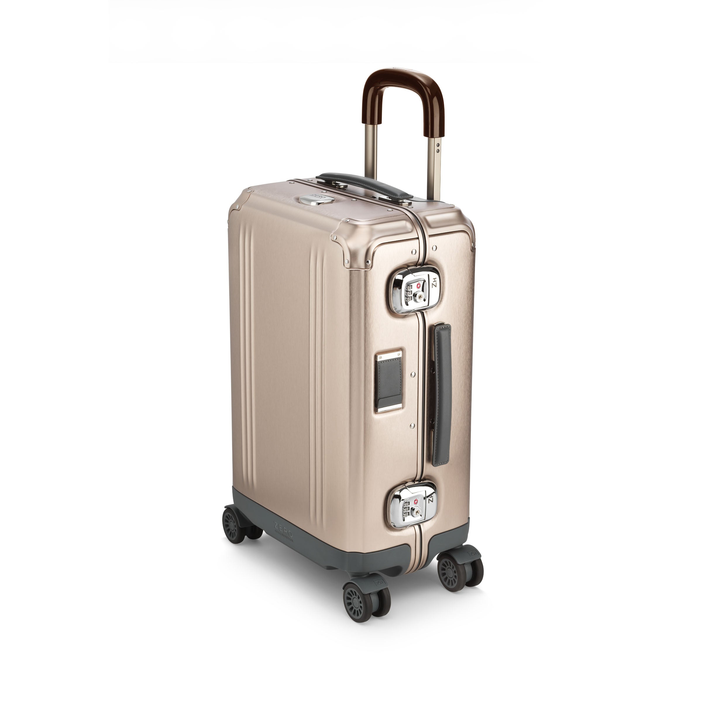 Gold suitcase with wheels and handle on a white background