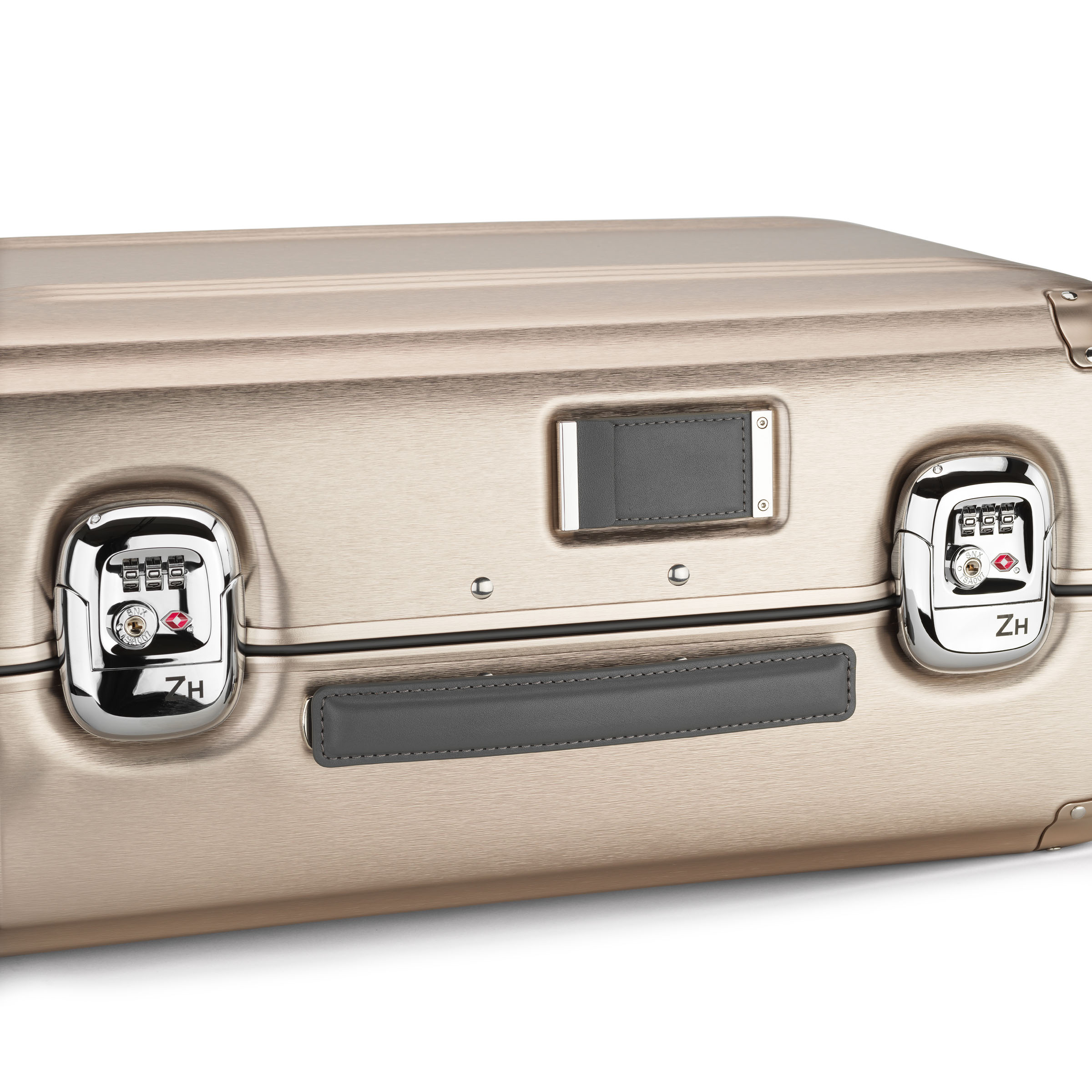 Gold suitcase with silver locks on a white background