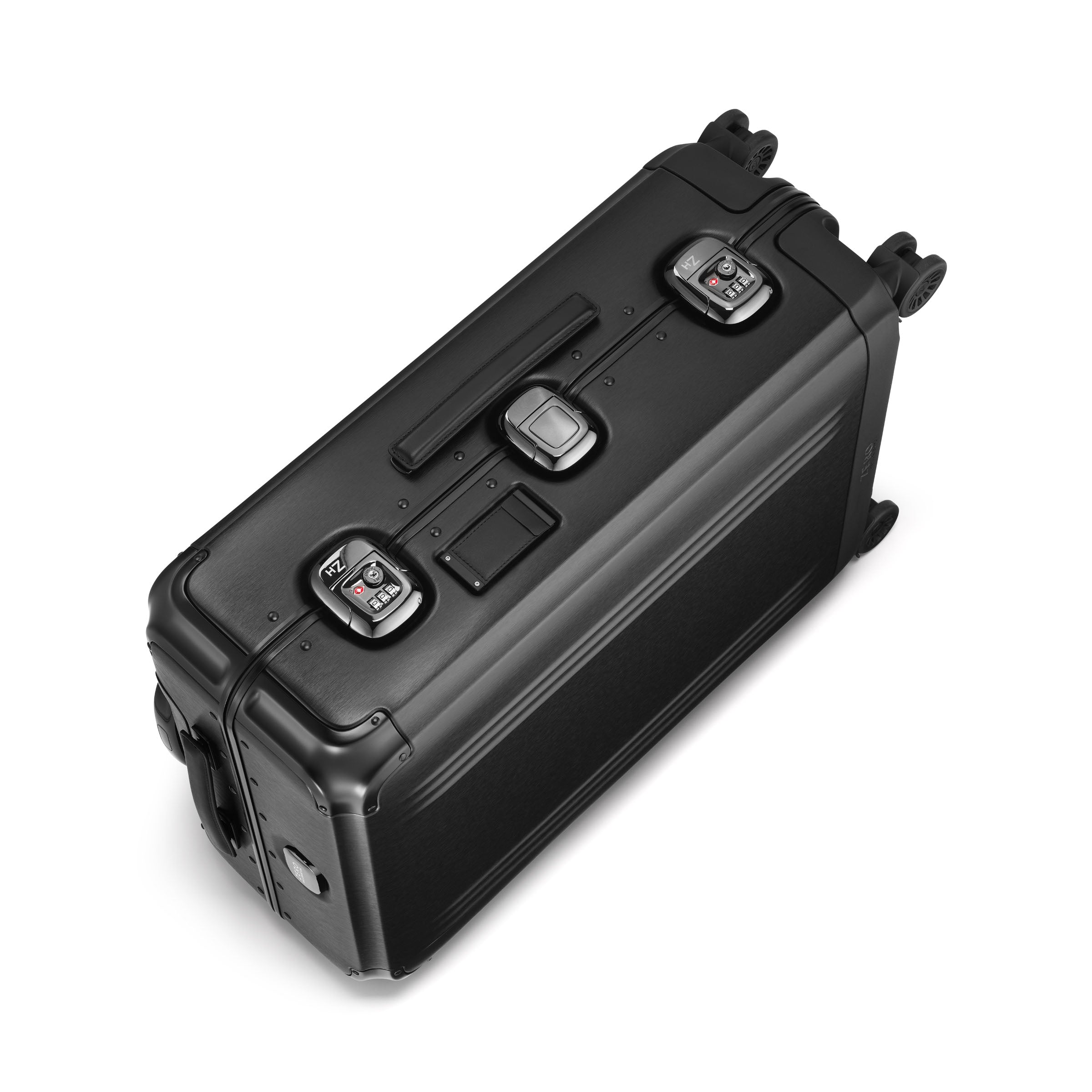 Black suitcase with wheels and handle on a white background
